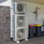 Air conditioning and heating unit for a residential house